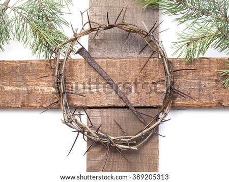 Crown of thorns hung around the Easter cross

