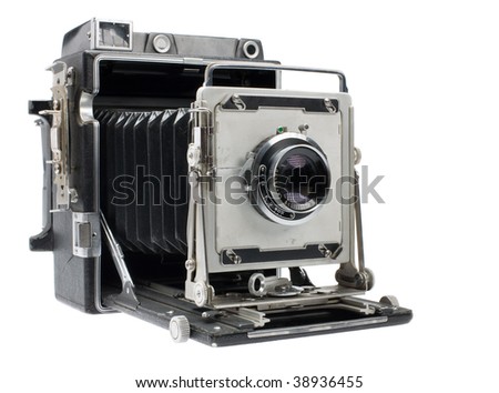 An antique large format camera isolated on a white background