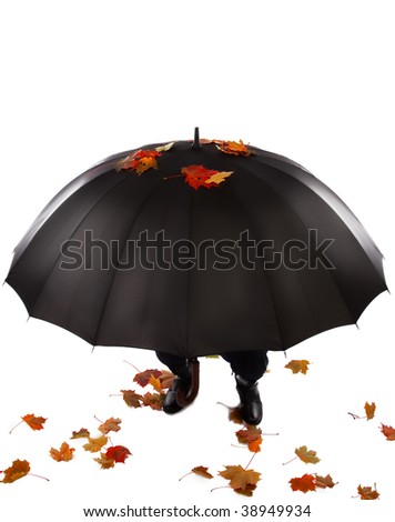 Picture of human hiding under open umbrella