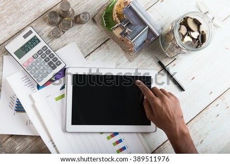 finance concept photo with coins and computer