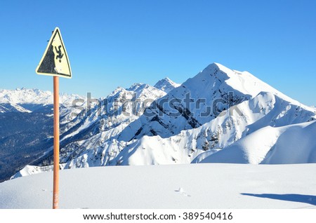 Russia, Sochi, information sign "Beware the gap" on the slopes of the ski resort Rosa Khutor