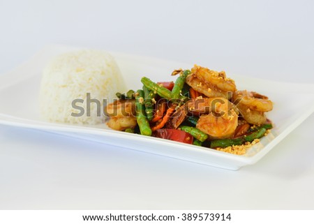 Spicy stir fried shrimp with red curry paste and Yard Long bean.