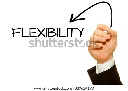 Businessman hand writing Flexibility word with a marker.