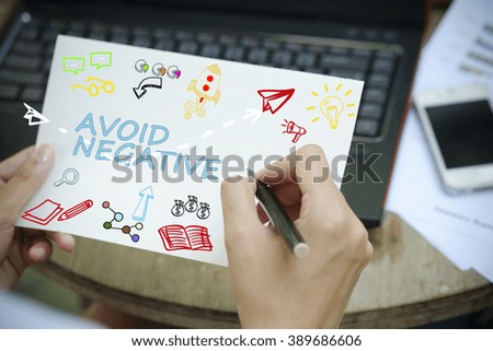 hand drawing  AVOID NEGATIVE  concept on white notebook , business concept , business idea , strategy concept , working at home concept