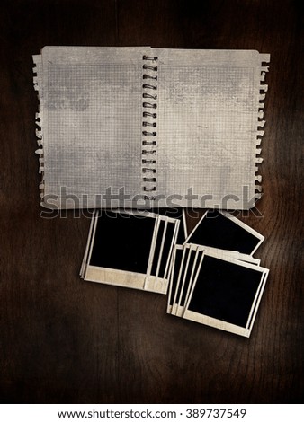 Vintage background with old notebook and photos
