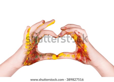 Woman hands painted make a heart shape