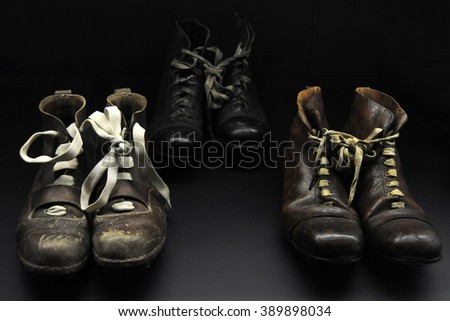  Old football boots  Royalty-Free Stock Photo #389898034