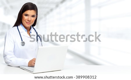 Doctor woman with laptop.