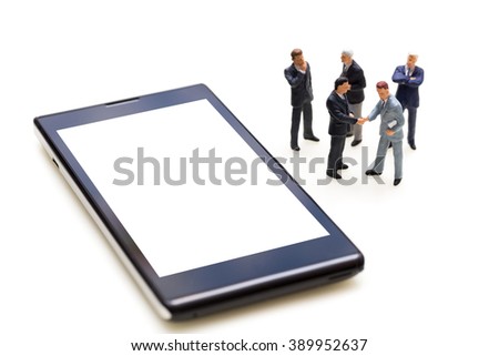 Miniature People Business Concept : Businessmen Handshaking For Agreement With Blank Mobile Phone
