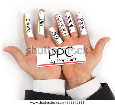 Photo of hands holding paper cards with PPC concept words