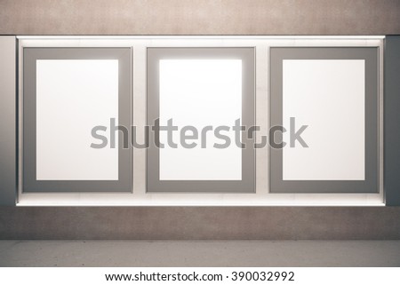 Blank picture frames on brown wall in empty room, mock up