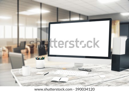 Blank monitor on wooden desktop with blurry office in the background, mock up, 3D Render
