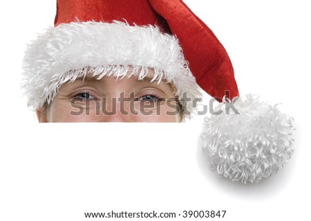 Woman in a santa hat with a sign in front of her with plenty of copyspace