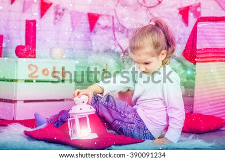 A cute little girl four years preparing for the holiday at home