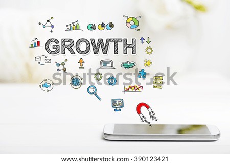 Growth concept with smartphone on white table