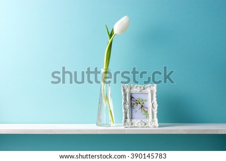 white tulip on the shelf