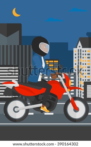 Woman riding motorcycle.