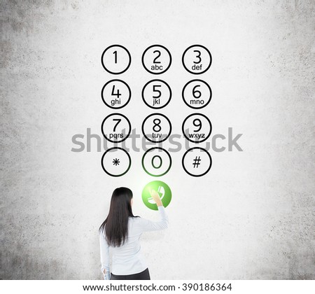 Businesswoman pressing green call button, buttons drawn on concrete wall. Back view. Concept of communication.
