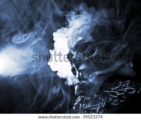 skull with chain in abstract smoke