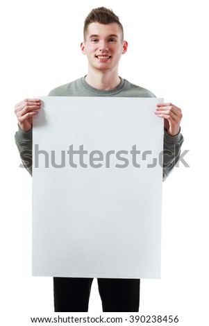 handsome young man holding big white blank