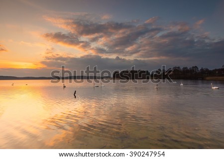 Lake landscape photographed at colorful sunset. Lake Krzywe in Olsztyn, Mazury lake district