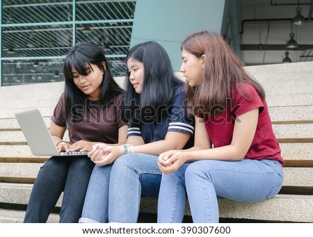 group of happy teen high school students outdoors, Asian, tutoring, Laptop, Tablet  