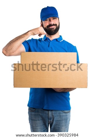 Delivery man making phone gesture