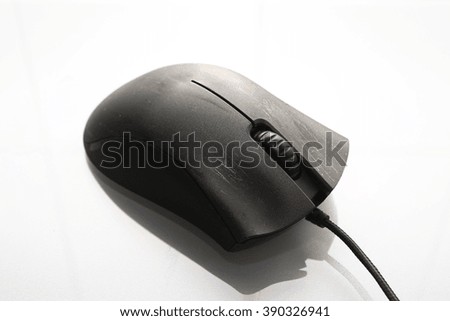 Old worn computer mouse on white background