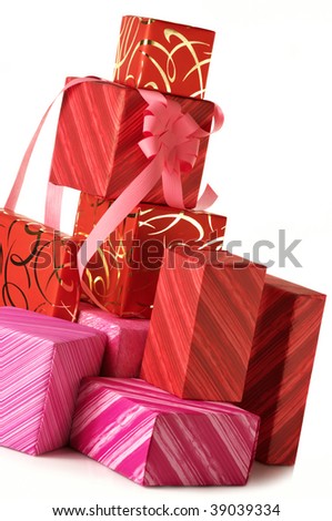Stack of multicolored gifts on white background.