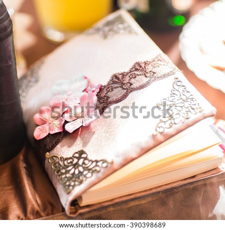 wedding wish book decorated with flowers and lace