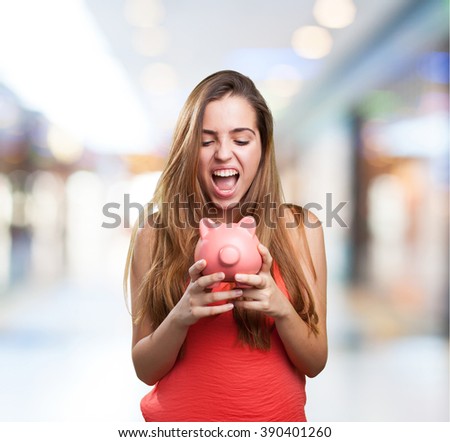 young cute woman shouting to her piggy bank