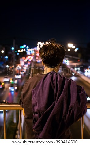 Lonely man in at night and bokeh