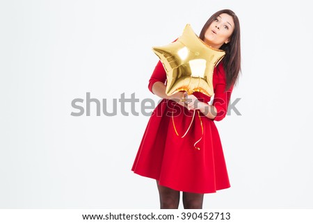 Happy woman in red dress holding balloon isolated on a white background