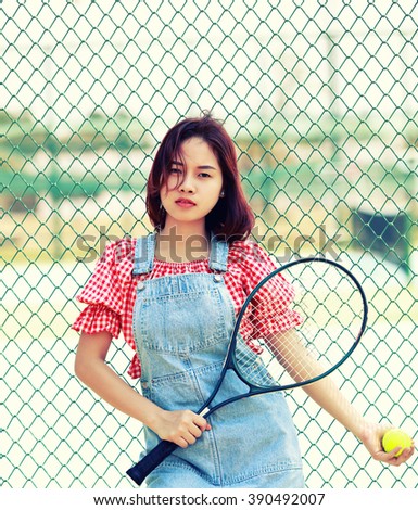 Sport girl with tennis set