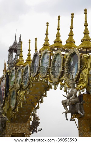 Thailand, Bangkok, downtown, decorative arc showing pictures of the King