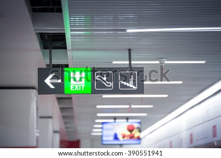 Illuminated Corporate Office Exit Sign Closeup.
