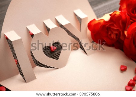 Valentine's Day concept. Beautiful gift card with roses, close up