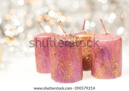 Four Christmas candles.