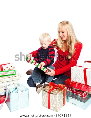 A caucasian mother and son opening christmas gifts