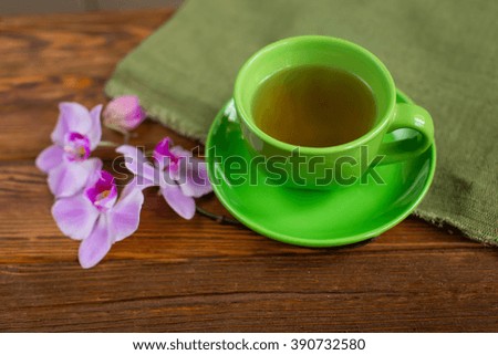good morning. cup of tea on a wooden background