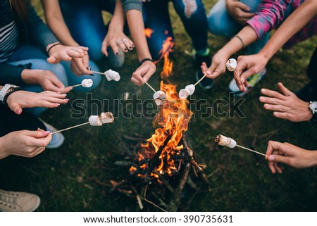 marshmallow on skewers Royalty-Free Stock Photo #390735631