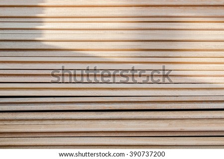 Closeup Stacked of wooden planks for interior materials. 