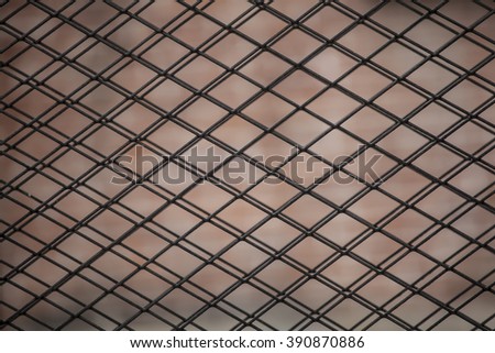 Full frame of wire mesh fence.