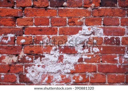 Texture of the old red brick wall closeup