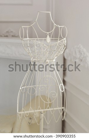 Vintage bridal metallic hanger in dress shape form