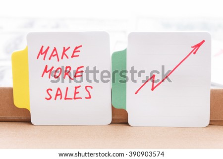 Text - Make More Sales. With Graphs and diagrams. Business concept.