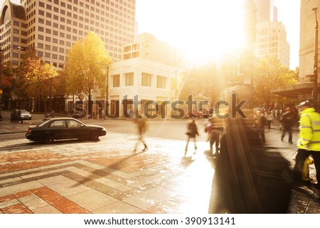 traffic on city road through modern buildings in seattle Royalty-Free Stock Photo #390913141