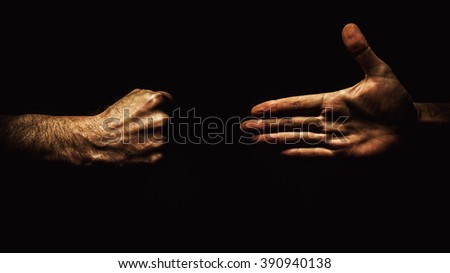 Conceptual composition about reconciliation or hate.  Royalty-Free Stock Photo #390940138