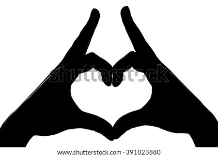 hands makes heart silhouette