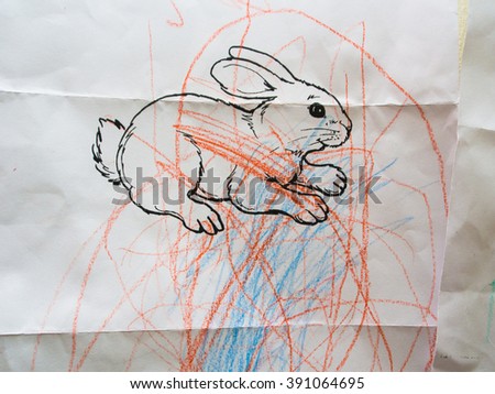 rabbit painting craftsmanship of a little boy. Abstract